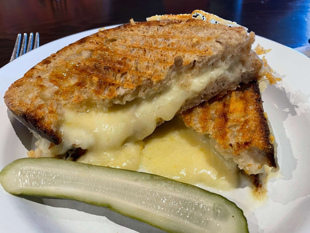 Grilled cheese sandwich and pickle